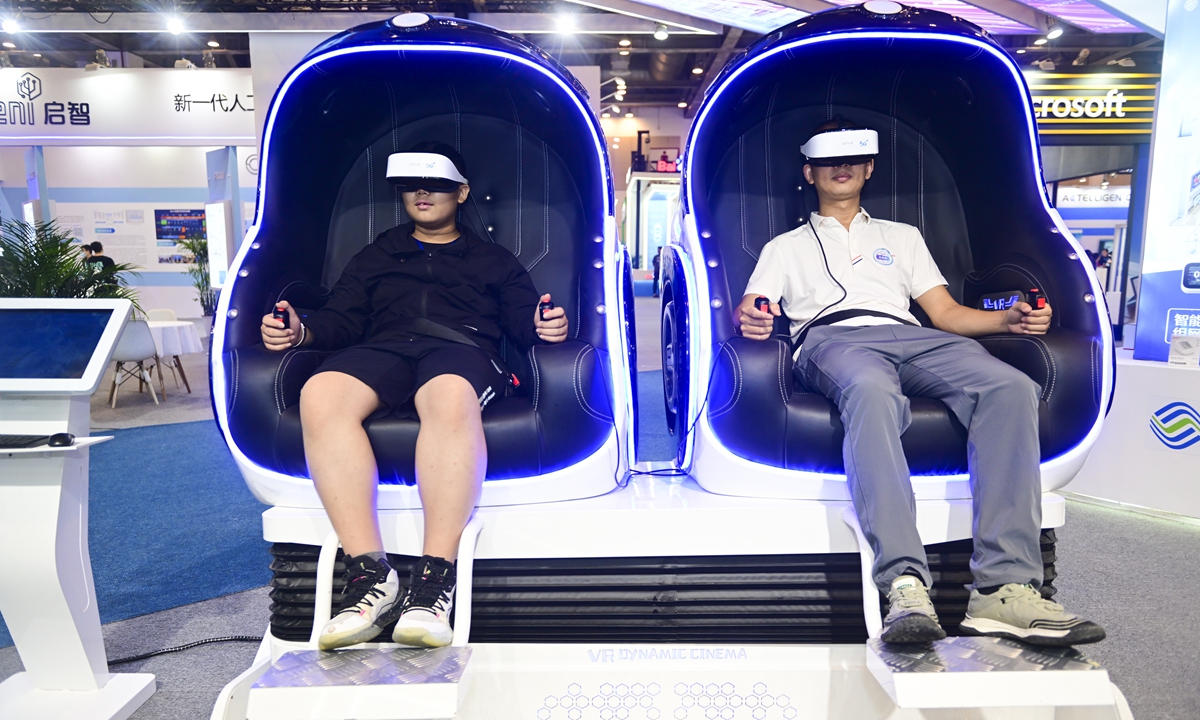 Visitors try out artificial intelligence (AI) products at the 2023 Global AI Product & Application Expo on June 25, 2023, in Suzhou, East China's Jiangsu Province. The three-day fair focuses on emerging industries including AI, industrial software and intelligent driving. Photo: IC