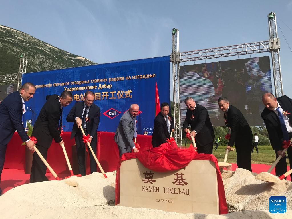 This photo taken with a mobile phone shows the groundbreaking ceremony for the Dabar Hydropower Plant in the entity Republika Srpska (RS) of Bosnia and Herzegovina, June 23, 2023. The project, with an installed capacity of 159.15 MW, is the largest hydropower project undertaken by Chinese enterprises in Central and Eastern Europe. (Xinhua/Zhang Xiuzhi)