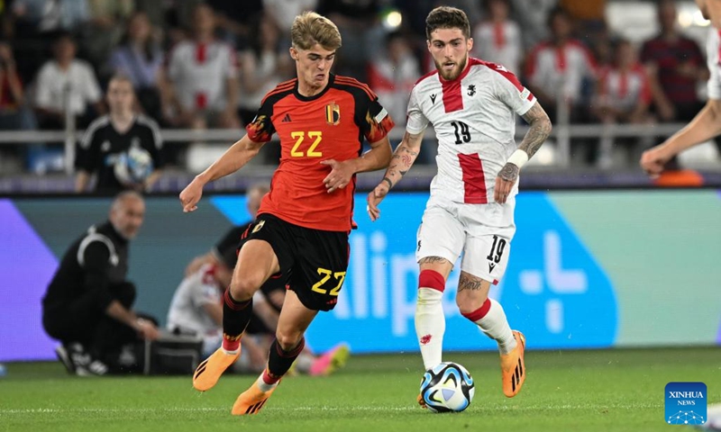 Giorgi Tsitaishvili (R) of Georgia vies with Charles De Ketelaere of Belgium during their group A match of the UEFA U21 Championship in Tbilisi, Georgia, on June 24, 2023. (Photo by Tamuna Kulumbegashvili/Xinhua)
