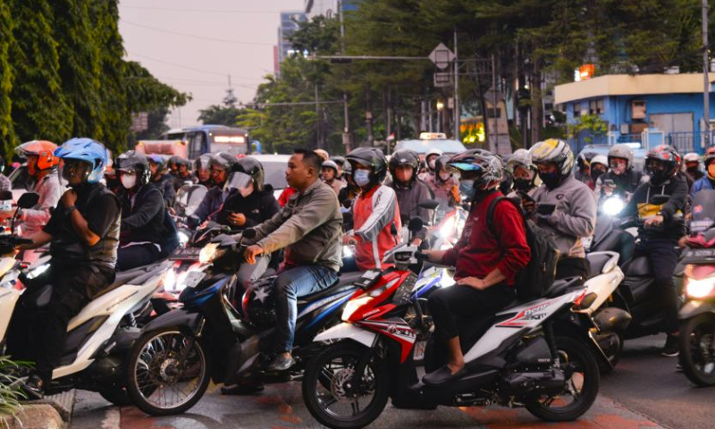 This photo taken on June 27, 2023 shows vehicles moving on a road ahead of Eid al-Adha in Jakarta, Indonesia. Many people left the capital city of Jakarta and headed for hometown ahead of the Eid al-Adha. (Xinhua/Xu Qin)