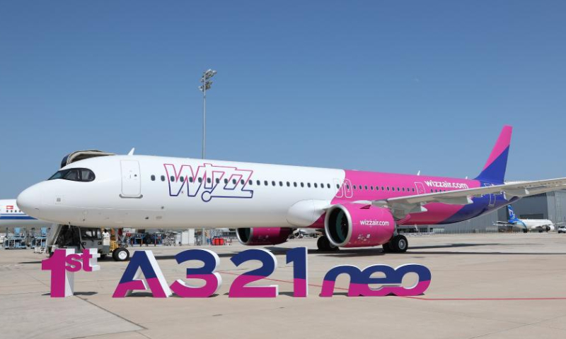 This photo taken on June 27, 2023 shows the A321neo aircraft delivered to Hungary's Wizz Air in north China's Tianjin. Airbus has, for the first time, delivered an aircraft assembled in north China's Tianjin Municipality to a European client. Hungary's Wizz Air, the largest Central and Eastern European low-cost carrier, took delivery of its first A321neo aircraft assembled in Airbus' Final Assembly Line (FAL Asia) at an event in Tianjin on Tuesday. (Xinhua)