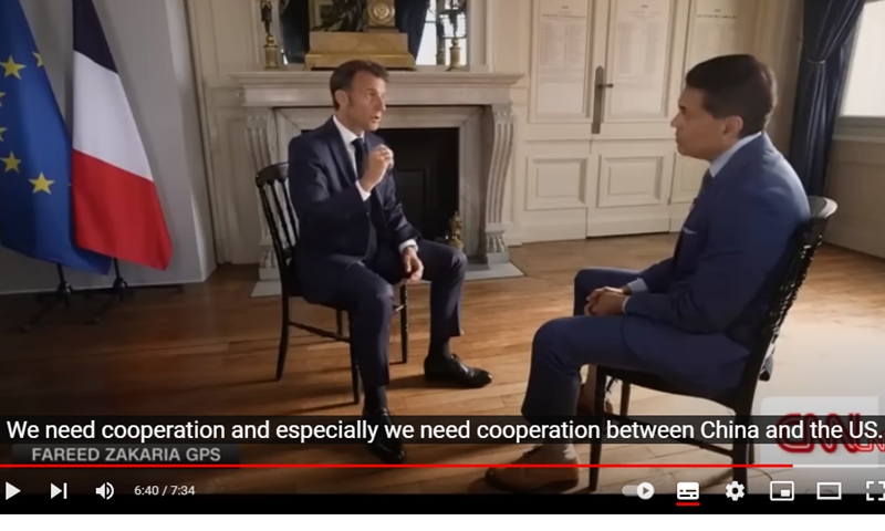 French President Emmanuel Macron (left) in an interview with CNN's Fareed Zakaria Photo: A screenshot from CNN's YouTube account