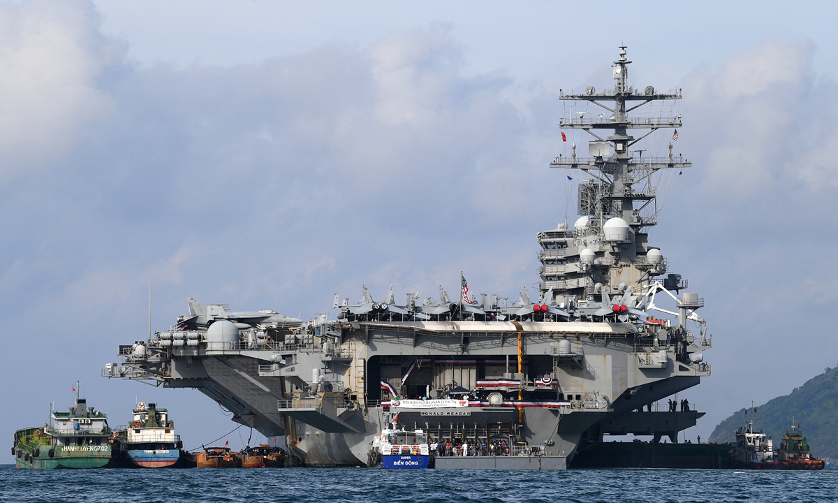 The USS Ronald Reagan, a US Navy Nimitz-class nuclear-powered aircraft carrier, docks at the port during a visit in Danang on June 25, 2023. Photo: AFP