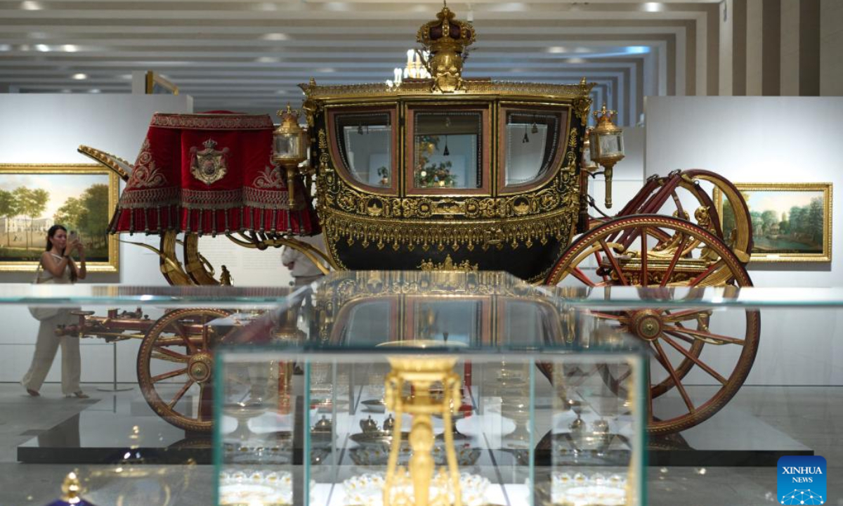 A visitor takes photos during a preview of an exhibition at the Royal Collections Gallery in Madrid, Spain, on June 28, 2023. The Spain's Royal Collections Gallery was officially opened to the public on Thursday. Photo:Xinhua