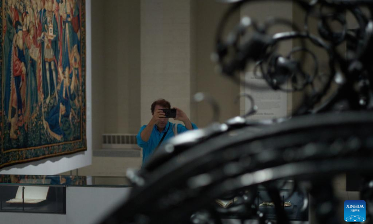 A visitor takes photos during a preview of an exhibition at the Royal Collections Gallery in Madrid, Spain, on June 28, 2023. The Spain's Royal Collections Gallery was officially opened to the public on Thursday. Photo:Xinhua