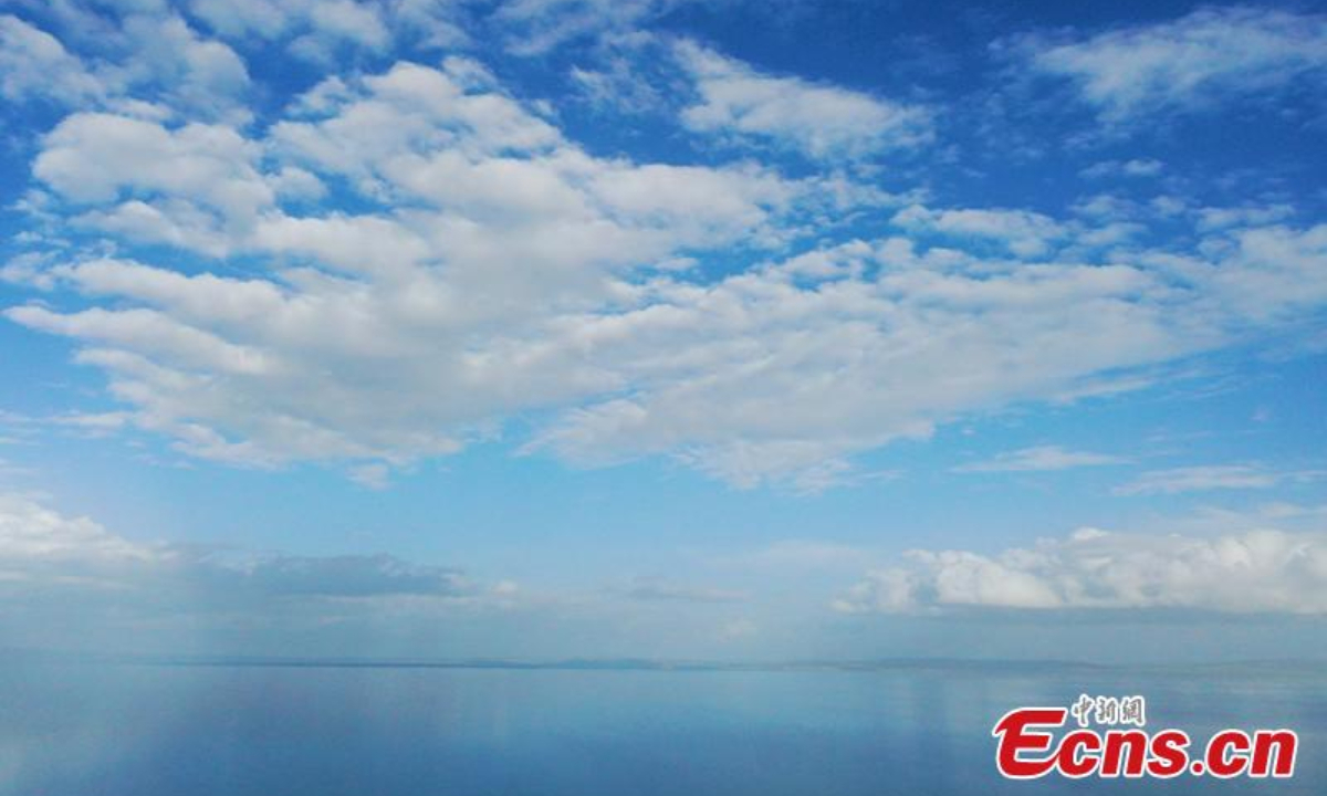 Magnificent scenery of blue colors of the Erling Lake and the sky merging on the horizon at Maduo County of Guoluo Tibetan Autonomous Prefecture, northwest China's Qinghai Province, June 28, 2023.