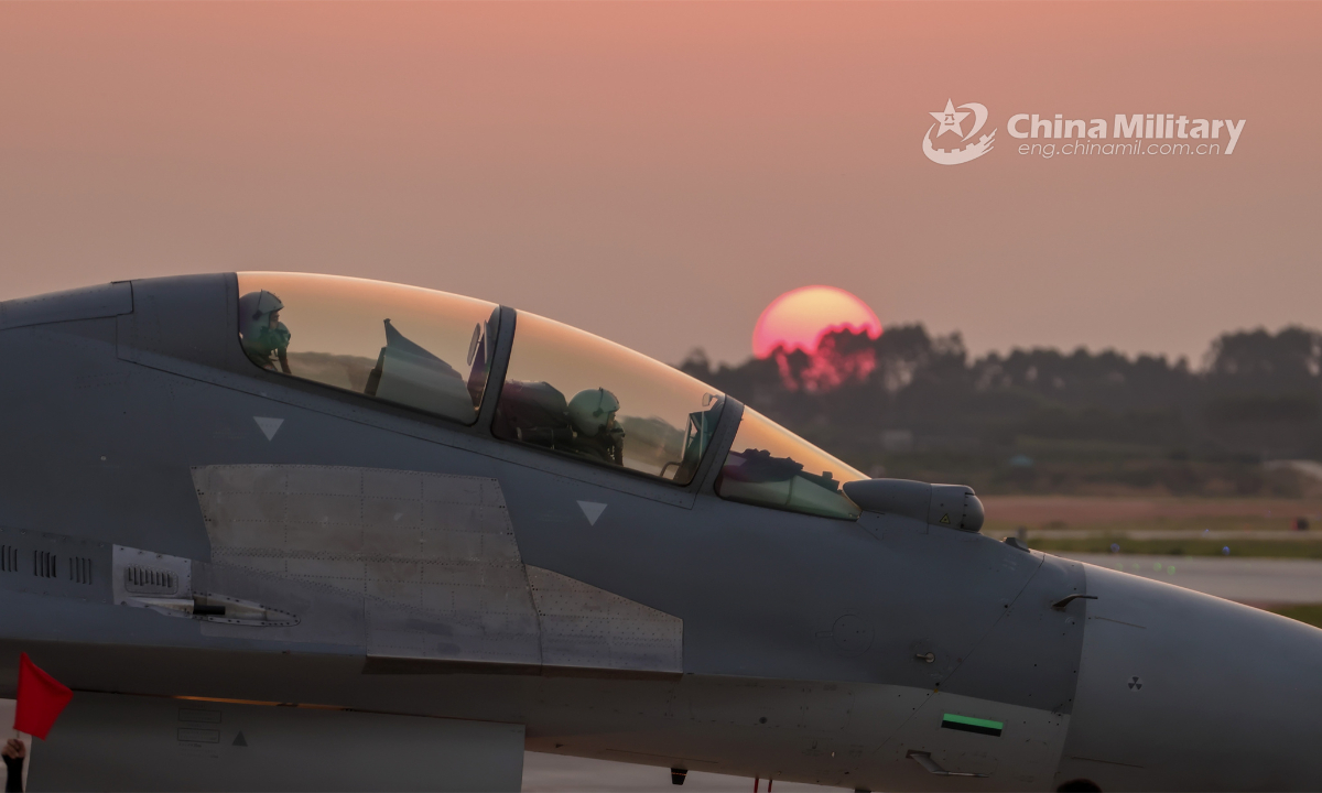 A fighter jet attached to an aviation brigade of the air force under the PLA Southern Theatre Command taxis on the runway during a round-the-clock flight training exercise in late June, 2023. Photo: China Military