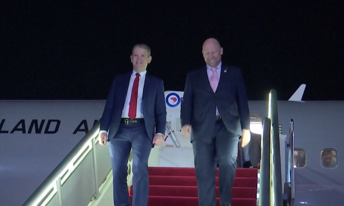 New Zealand Prime Minister Chris Hipkins (left) and New Zealand Ambassador to China Grahame Morton get off the airplane in Beijing on June 25, 2023. Photo: VCG