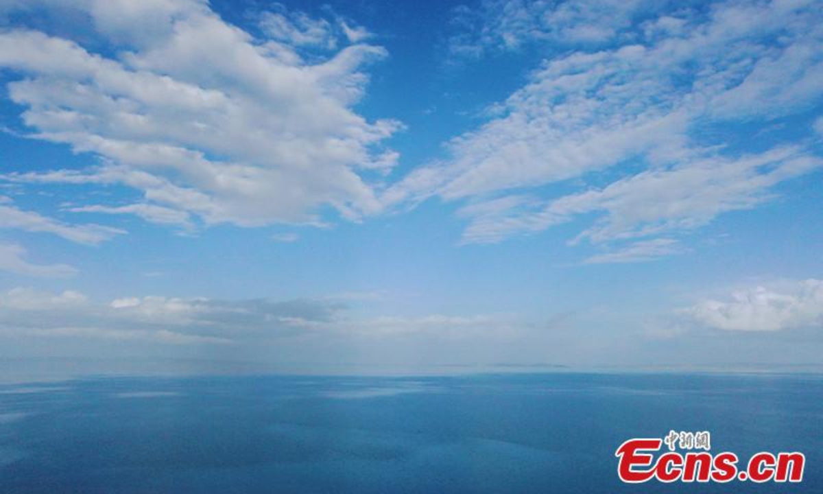 Magnificent scenery of blue colors of the Erling Lake and the sky merging on the horizon at Maduo County of Guoluo Tibetan Autonomous Prefecture, northwest China's Qinghai Province, June 28, 2023.