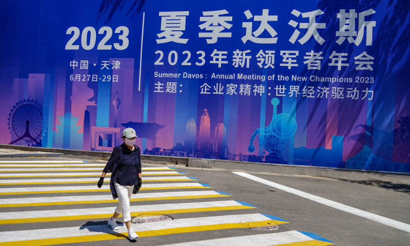 The slogan board for the 2023 Summer Davos is seen in the city center of Tianjin on June 21, 2023. Photo: VCG