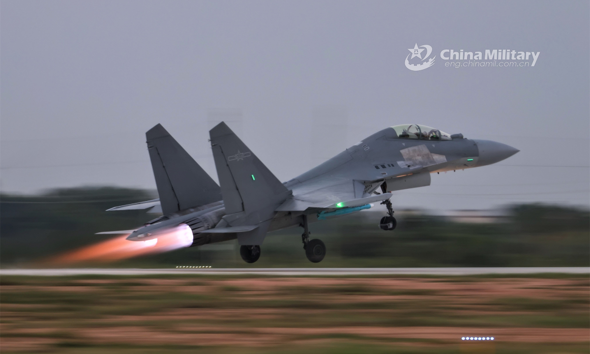A fighter jet attached to an aviation brigade of the air force under the PLA Southern Theatre Command takes off during a round-the-clock flight training exercise in late June, 2023. Photo: China Military
