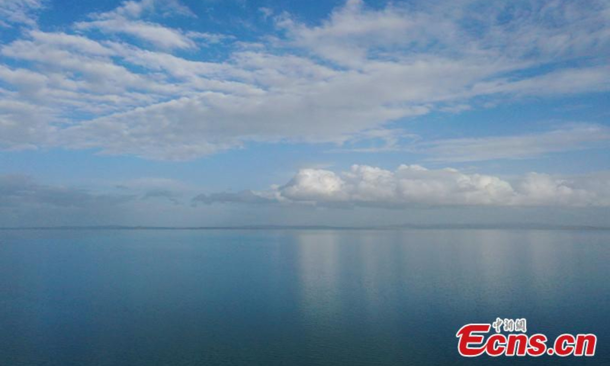 Magnificent scenery of blue colors of the Erling Lake and the sky merging on the horizon at Maduo County of Guoluo Tibetan Autonomous Prefecture, northwest China's Qinghai Province, June 28, 2023.