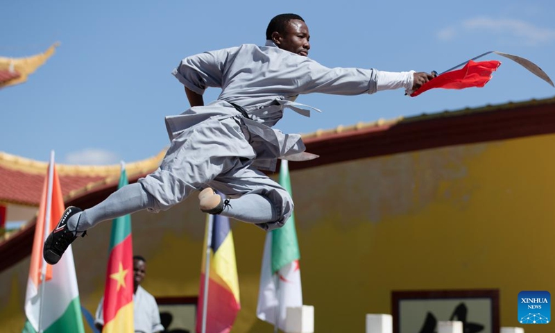 A participant demonstrates Kung Fu during the 2023 African Shaolin Kungfu Games held at the Shaolin Cultural center in Lusaka, Zambia, June 25, 2023. The Shaolin Temple in Zambia has organized the first-ever African Shaolin Kung Fu Games and other activities aimed at promoting the sport on the African continent and promoting cultural exchange(Photo: Xinhua)