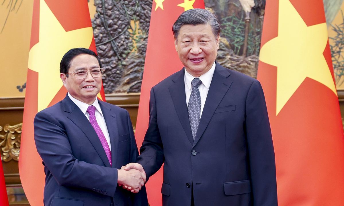 Chinese President Xi Jinping (right) meets with visiting Prime Minister of Vietnam Pham Minh Chinh in Beijing on June 27, 2023. Photo: Xinhua