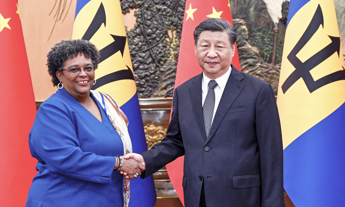 Chinese President Xi Jinping (right) meets with visiting Prime Minister of Barbados Mia Amor Mottley in Beijing on June 27, 2023. Photo: Xinhua