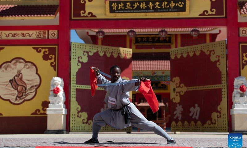 A participant demonstrates Kung Fu during the 2023 African Shaolin Kungfu Games held at the Shaolin Cultural center in Lusaka, Zambia, June 25, 2023. The Shaolin Temple in Zambia has organized the first-ever African Shaolin Kung Fu Games and other activities aimed at promoting the sport on the African continent and promoting cultural exchanges.(Photo: Xinhua)