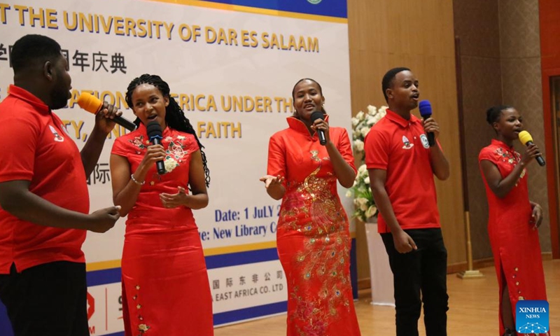 Tanzanian teachers sing a Chinese song at the 10th-anniversary celebration of the Confucius Institute at the University of Dar es Salaam in Dar es Salaam, Tanzania, on July 1, 2023. The Confucius Institute at the University of Dar es Salaam in Tanzania on Saturday celebrated its 10th anniversary. Government officials, Chinese diplomats in Tanzania, representatives from Confucius institutes and Chinese companies in the country attended the ceremony.  (Photo by Herman Emmanuel/Xinhua)