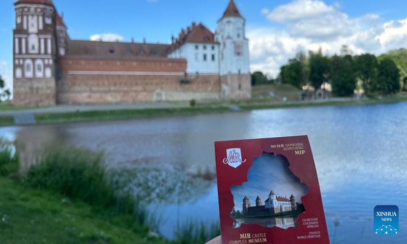 This photo taken on June 30, 2023 shows the Mir Castle and its ticket in Grodno region, Belarus. The Mir Castle Complex is a unique monument of Belarusian architecture and was built in the early 16th century. It was listed as a world heritage site by the UNESCO in 2000. (Xinhua/Lu Jinbo)