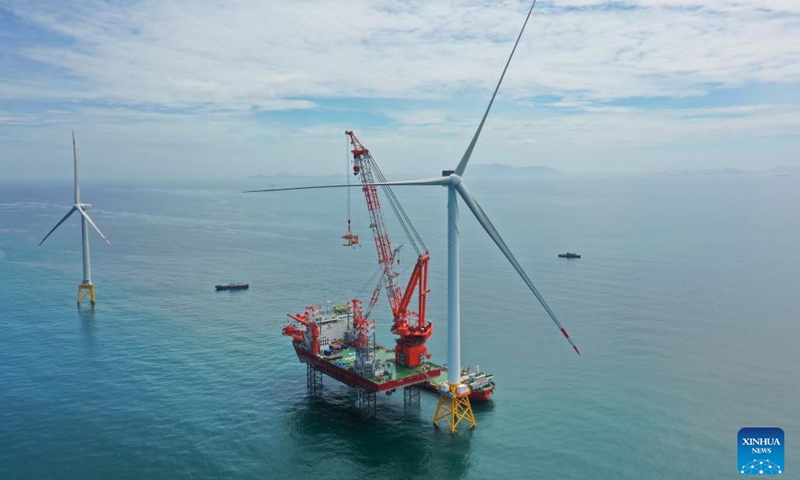 This aerial photo shows the construction site of the world's first 16-megawatt offshore wind turbine in Fuzhou, southeast China's Fujian Province, June 28, 2023. The construction of the giant offshore wind turbine, with the world's largest per-unit capacity, was completed here on Wednesday, according to China Three Gorges Corporation. (Photo:Xinhua)