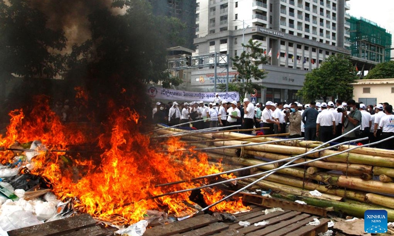 Illicit drugs and ingredients are burned down in Phnom Penh, Cambodia, June 28, 2023. Cambodia on Wednesday destroyed 5.71 tons of illicit drugs and ingredients, officials said. (Photo: Xinhua)