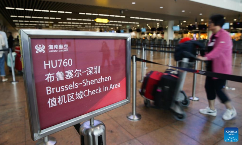 A passenger heads for the check-in counter for Hainan airlines at the Brussels Airport in Zaventem, Belgium, June 28, 2023. A ceremony was held for China's Hainan airlines at Brussels Airport on Wednesday to mark the resumption of its Brussels-Shenzhen direct flights.(Photo: Xinhua)