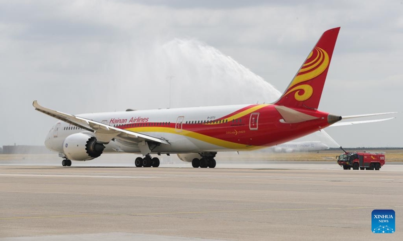 Hainan airlines HU760 flight receives a water salute before taking off for Shenzhen at Brussels Airport in Zaventem, Belgium, June 28, 2023. A ceremony was held for China's Hainan airlines at Brussels Airport on Wednesday to mark the resumption of its Brussels-Shenzhen direct flights.(Photo: Xinhua)