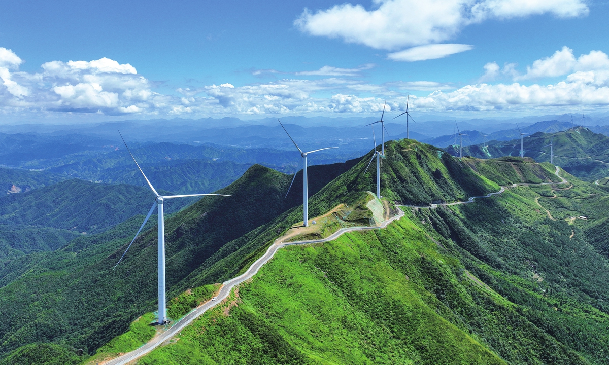 A wind power project is seen along the mountains in Ji'an, East China's Jiangxi Province, on July 6, 2023. By the end of May, the installed capacity of wind power in China had risen 12.7 percent year-on-year to approximately 380 million kilowatts, official data showed. Photo: cnsphoto