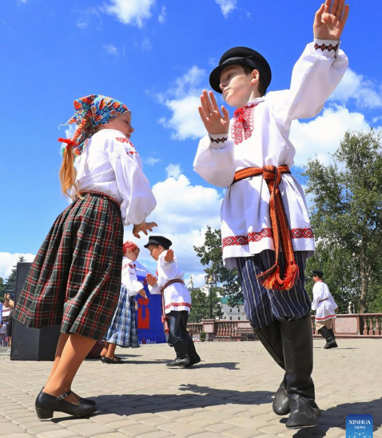 People dance during a folk dance competition in Vitebsk, Belarus, July 15, 2023. A folk dance competition was held here during the 32nd International Festival of Arts Slavianski Bazaar. (Photo by Henadz Zhinkov/Xinhua)