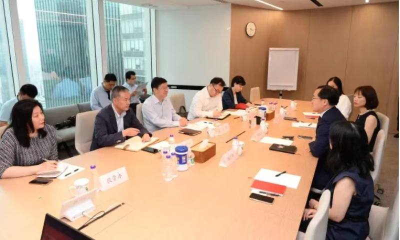 Yu Yong, Party Secretary of the CPC Jing'an District Committee visits Shanghai office of Bain & Company on July 5, 2023. Photo: Official WeChat account of Bain & Company