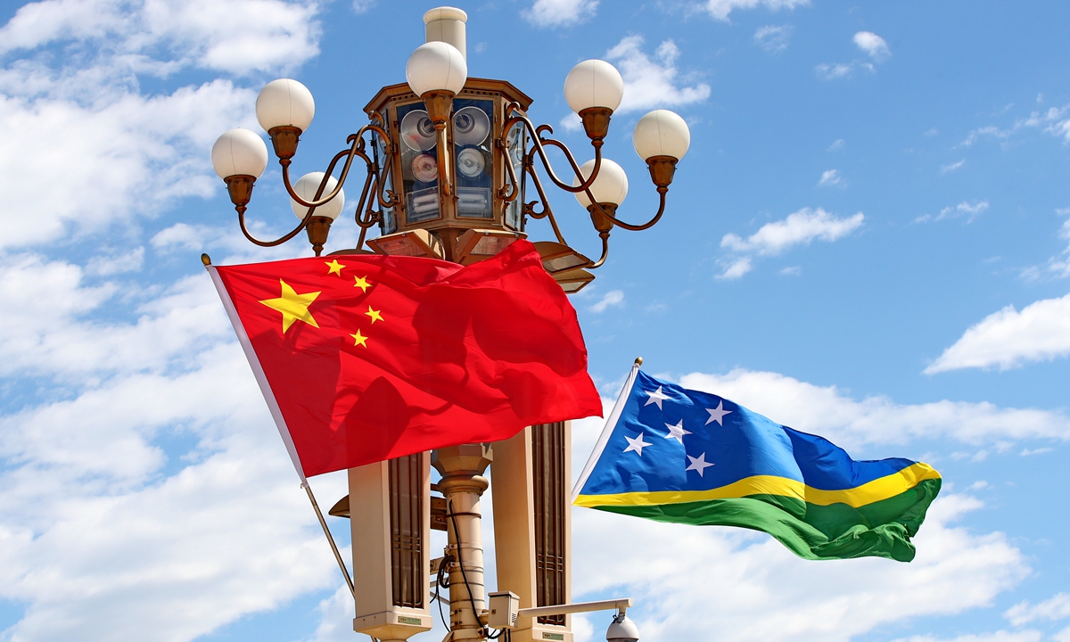 National flags of China and Solomon Islands Photo: VCG