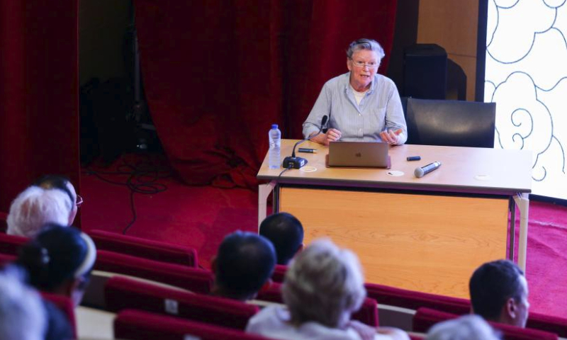 Simone Schuiten, a former professor of an art school in Brussels, shares her understanding on Chinese art at the China Cultural Center in Brussels, Belgium, July 14, 2023. A Chinese and European cultural dialogue was held here on Friday. (Xinhua/Zheng Huansong)