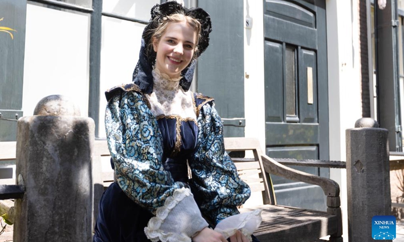 An actress poses for a photo during the Rembrandt Days in Leiden, the Netherlands, July 8, 2023. During the two-day event, the city's historic center is transformed into 17th-century atmospheres to celebrate the life and work of Dutch painter Rembrandt van Rijn. Leiden is the birthplace of Rembrandt. (Photo by Sylvia Lederer/Xinhua)