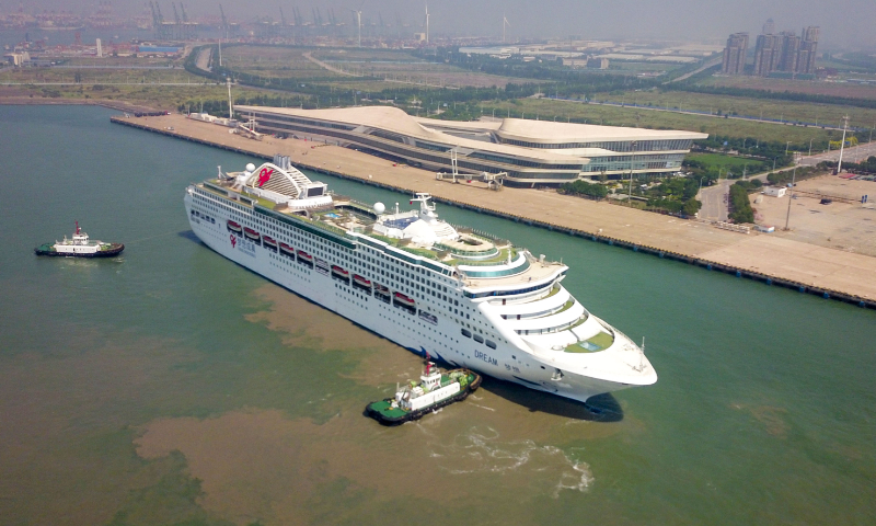Liberian cruise ship named <em>Dream</em> successfully docks at the Tianjin International Cruise Home Port in North China's Tianjin Municipality on July 9, 2023. It is the first international cruise ship ushered in by Tianjin Port in three years. The cruise ship has a capacity of more than 2,000 passengers. Photo: VCG
