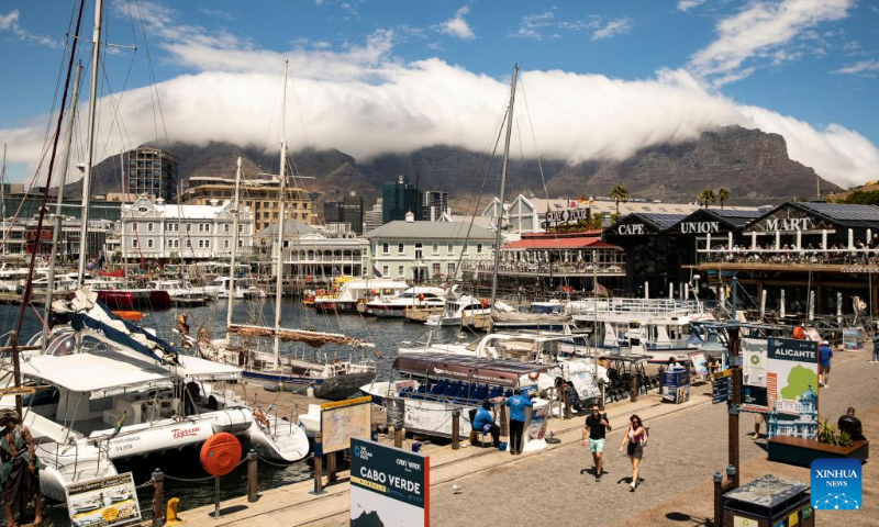 People visit V&A Waterfront in Cape Town, South Africa, Feb. 16, 2023. (Xinhua/Zhang Yudong)