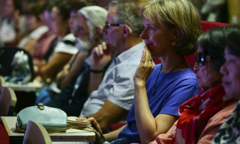 Audience attend a Chinese and European cultural dialogue at the China Cultural Center in Brussels, Belgium, July 14, 2023. (Xinhua/Zheng Huansong)