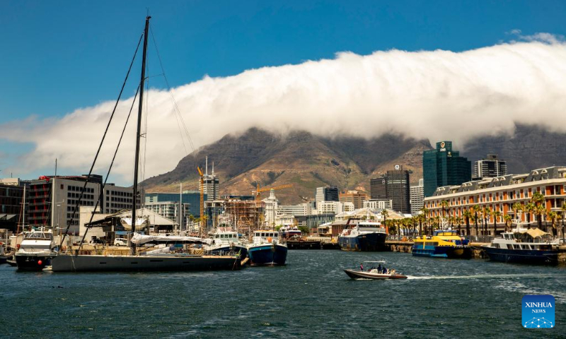 People visit V&A Waterfront in Cape Town, South Africa, Feb. 16, 2023. (Xinhua/Zhang Yudong)
