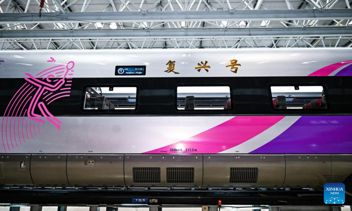 This photo taken on July 21, 2023 shows the exterior view of the Fuxing bullet train specially designed for the Hangzhou Asian Games in Changchun, northeast China's Jilin Province. The train rolled off in Changchun on Friday. Photo:Xinhua
