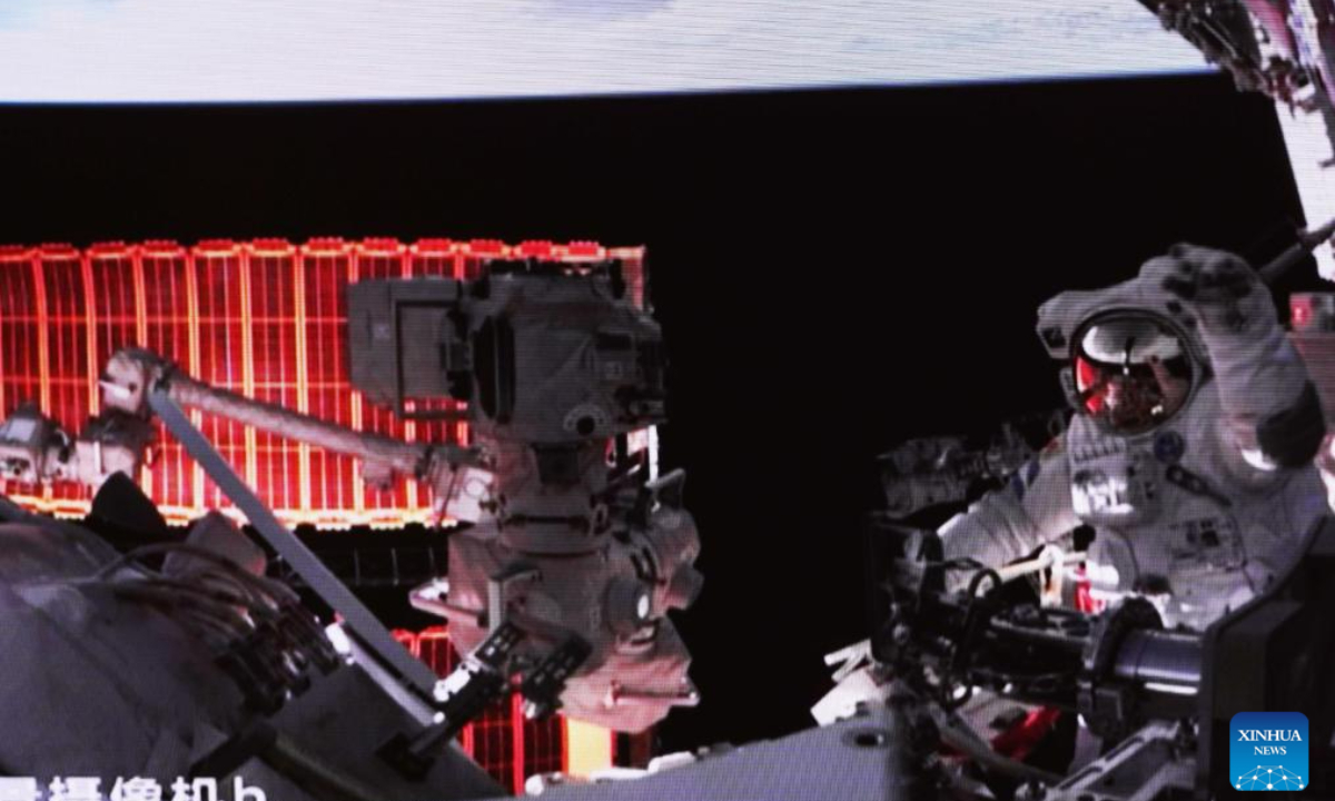 This screen image captured at Beijing Aerospace Control Center on July 20, 2023 shows Shenzhou-16 astronaut Jing Haipeng waving after exiting the Wentian lab module. Photo:Xinhua