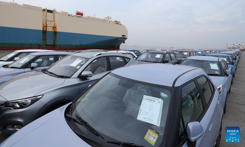 This aerial photo taken on July 9, 2023 shows MG cars produced by Shanghai Automotive Industry Corp (SAIC) to be shipped to Australia at Shanghai Haitong International Automotive Terminal in Waigaoqiao of east China's Shanghai. The Waigaoqiao Haitong pier is one of China's largest auto-export terminals. (Xinhua/Fang Zhe)