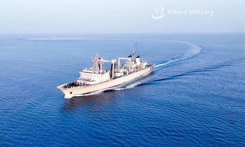 The comprehensive supply ship Luomahu attached to a navy support flotilla under the PLA Southern Theater Command steams to target waters during a comprehensive support exercise on May 23, 2023. (eng.chinamil.com.cn/Photo by Liu Ruiyan)