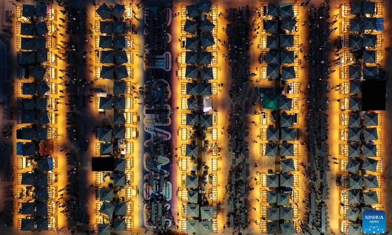 This aerial photo taken on July 5, 2023 shows the Baishamen cultural and creative bazaar in Haikou, south China's Hainan Province.(Photo: Xinhua)