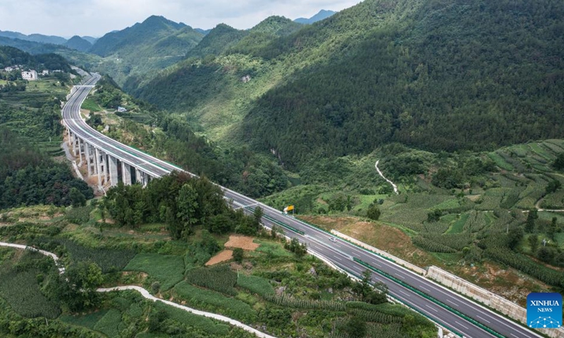 This aerial photo taken on July 10, 2023 shows a section of the Dejiang-Yuqing expressway in southwest China's Guizhou Province. The Dejiang-Yuqing expressway was completed and opened to traffic on Monday, which has a total length of 104.324 kilometers and connects five counties including Dejiang, Sinan, Fenggang, Shiqian and Yuqing of the cities of Tongren and Zunyi in Guizhou.(Photo: Xinhua)
