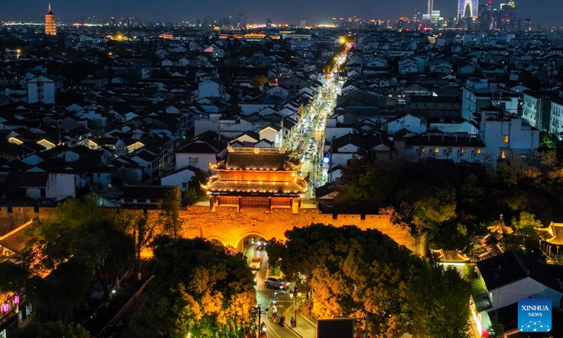 This aerial photo taken on April 10, 2023 shows the night view of the Changmen gate in Suzhou, east China's Jiangsu Province. Suzhou, a city with a history of over 2,500 years, is referred to as heaven on earth in a famous Chinese adage.(Photo: Xinhua)