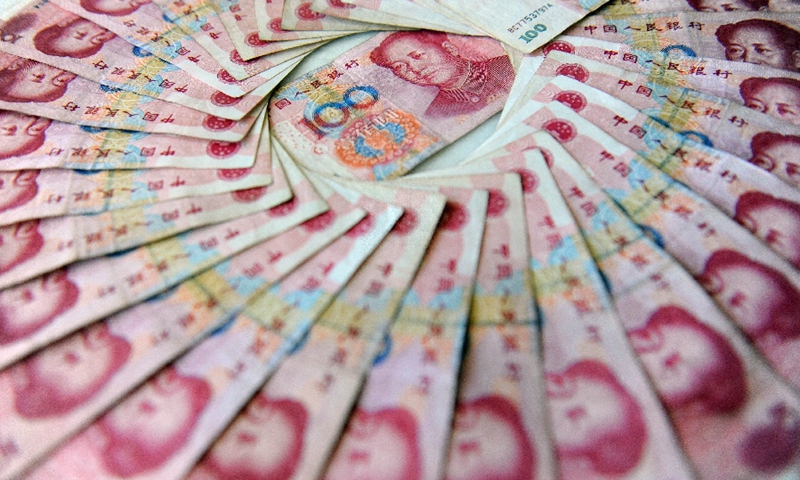 File photo shows the Chinese currency renminbi.(Photo: Xinhua)