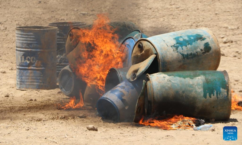 Drug processing facilities are burnt down in Jawzjan province, Afghanistan, July 10, 2023. Police have discovered and destroyed a drug processing lab and arrested its owner in north Afghanistan's Jawzjan province, Mohammad Younus Akhundzada, the provincial director for counter-narcotics police, said Wednesday.(Photo: Xinhua)