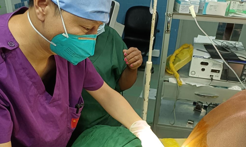 Wu Shi, an anesthesiologist of the Chinese medical meam, induces anesthesia for a patient at the Maputo Central Hospital in Maputo, Mozambique, Jan. 5, 2023. The 24th Chinese medical team dispatched to Mozambique has been providing medical services at the Maputo Central Hospital since October 2022. The Chinese government has been sending medical teams to Mozambique since 1976. (Chinese medical team to Mozambique/Handout via Xinhua)