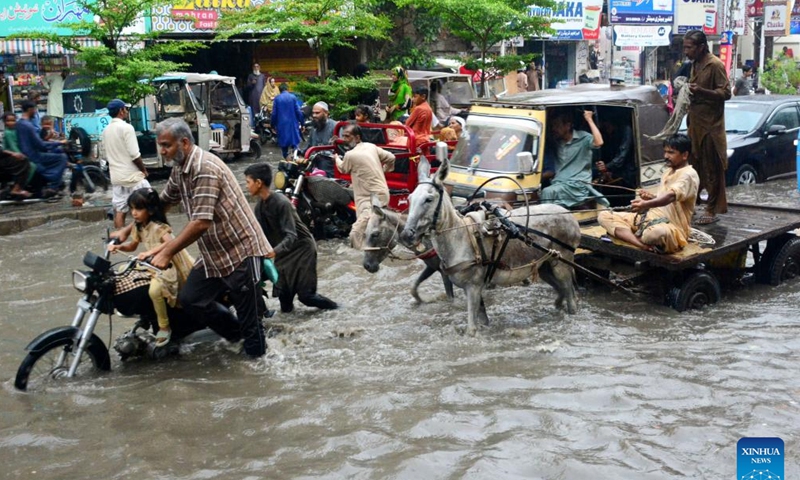 Roads flooded after heavy monsoon rain in Pakistan's Hyderabad - Global ...