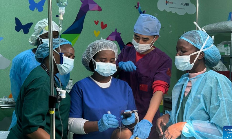 Fang Dengfeng, an anesthesiologist (2nd R) of the Chinese medical team, supervises a local doctor during an intubation at the Maputo Central Hospital in Maputo, Mozambique, July 17, 2023. The 24th Chinese medical team dispatched to Mozambique has been providing medical services at the Maputo Central Hospital since October 2022. The Chinese government has been sending medical teams to Mozambique since 1976. (Chinese medical team to Mozambique/Handout via Xinhua)