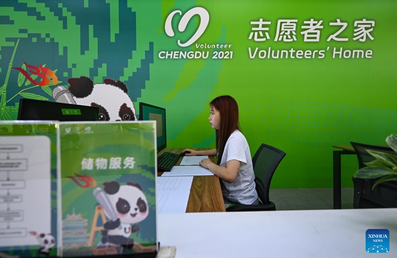 A volunteer works at the Volunteers' Home of the Universiade Village, Chengdu, southwest China's Sichuan Province, July 15, 2023. Photo: Xinhua