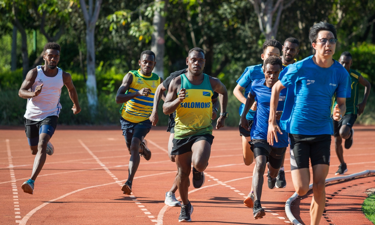 Solomon Islands track and field athletes and their coaches train on the training base's track on July 16, 2023. Photo: Chen Tao/GT